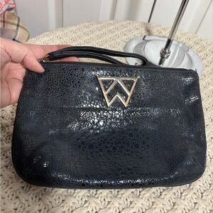 Kelly Wynne Pouch with Wrist Strap